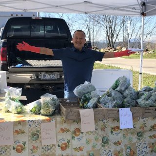 Tou Lee of Lee's One Fortune Farm at the ASAP Farmers Market at A-B Tech