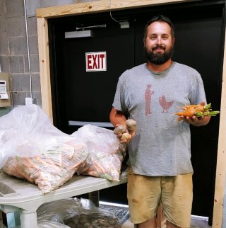 Joe Sumpter of Red Hill Farm delivering product to Yokefellow in Caldwell Co.