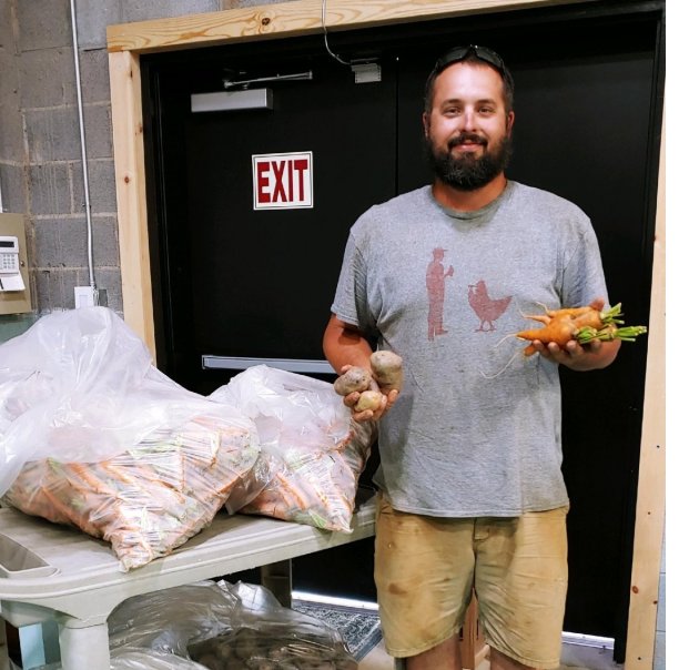 Joe Sumpter of Red Hill Farm delivering product to Yokefellow in Caldwell Co.