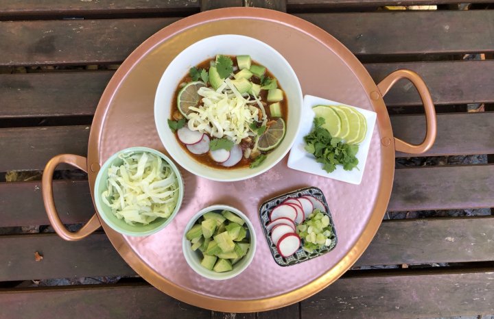 Red pozole and toppings