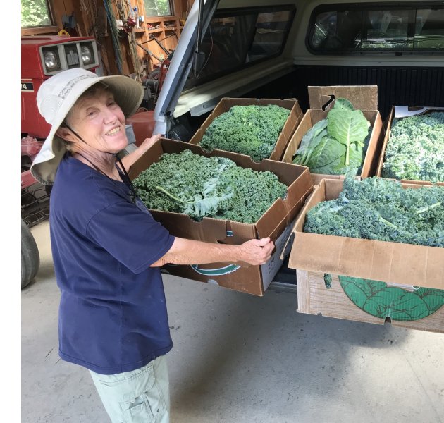 Eileen Droescher of Ol' Turtle Farm with kale