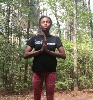 Demacy Monte-Parker leading virtual yoga for Transylvania Farmers Market