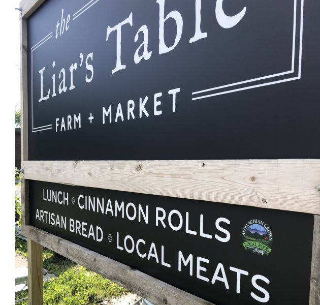 Appalachian Grown logo on a sign for The Liar's Table, funded by ASAP's cost share
