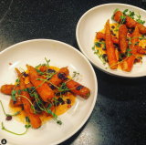 carrots and sprouts on a white plate