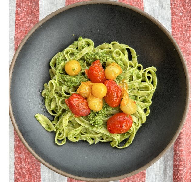 fettuccine with arugula pesto and blistered cherry tomatoes
