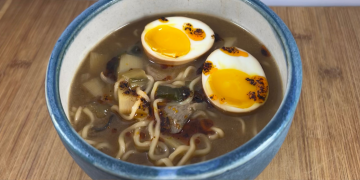 blue bowl with ramen and ramen egg