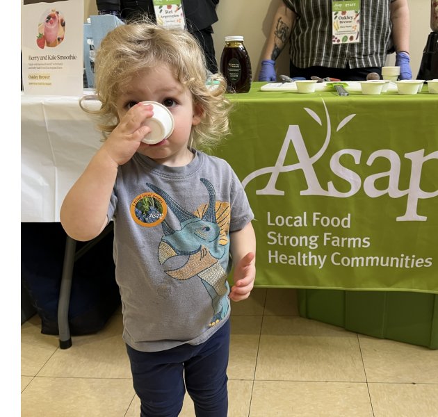 Tasting a berry-kale smoothie at ASAP's CSA Fair